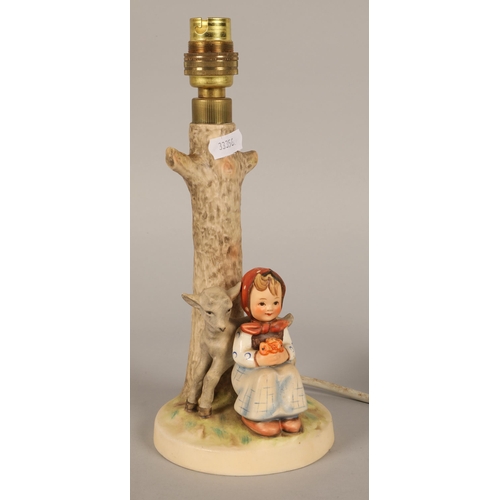 280 - M J Hummel lamp with a girl seated and four other Hummel figures (5)