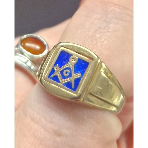 181 - Illegibly marked gold masonic spinner signet ring, ring size Q, 4.8g