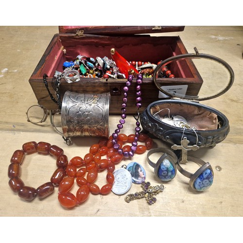 108 - Box of assorted jewellery and curios including beads, silver, crucifixes and St. Christopher pendant... 