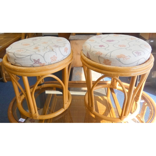 410 - Two modern cane stools.