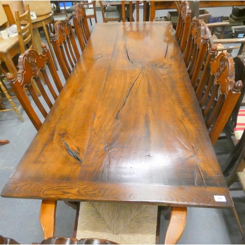 449 - Large modern acacia wood dining table with two carvers and six chairs. L.220cm x W.90cm x 77cm