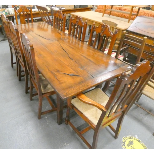 449 - Large modern acacia wood dining table with two carvers and six chairs. L.220cm x W.90cm x 77cm