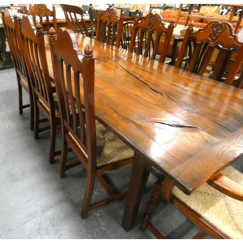 449 - Large modern acacia wood dining table with two carvers and six chairs. L.220cm x W.90cm x 77cm