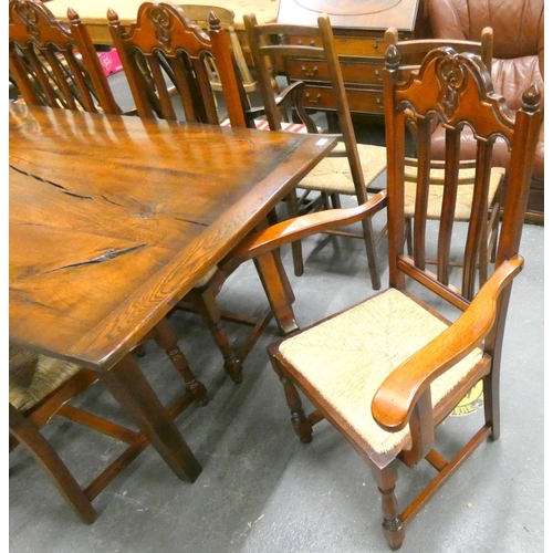 449 - Large modern acacia wood dining table with two carvers and six chairs. L.220cm x W.90cm x 77cm