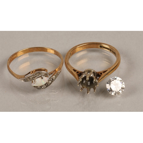 168 - Two 9ct gold rings set with white gems and one with an opal, gross weight 3.2g