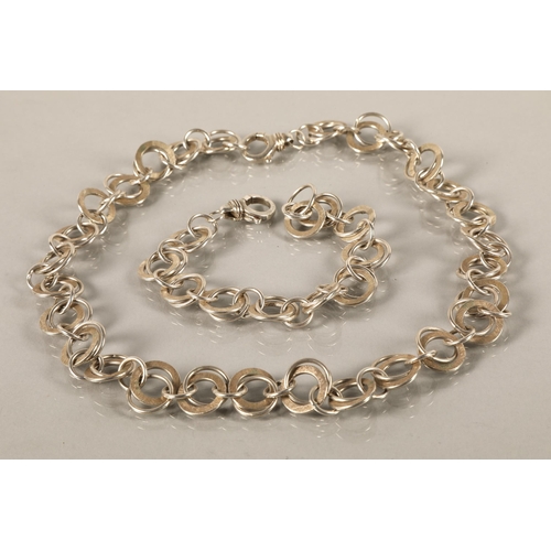 109 - Christine Sadler contemporary silver necklace and matching bracelet, gross weight 71.8g