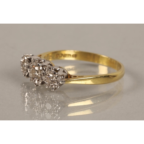 111 - 18ct gold ring set with a trio of diamonds, ring size P, 3.2g