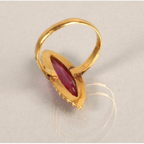 91 - High karat yellow gold ring set with a pink gem, illegibly marked, 5g, ring size O/P