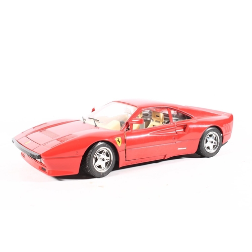 Four Burago 1 18 scale diecast model vehicles to include 3019 IT Ferrari Testarossa 1984 Italia 9