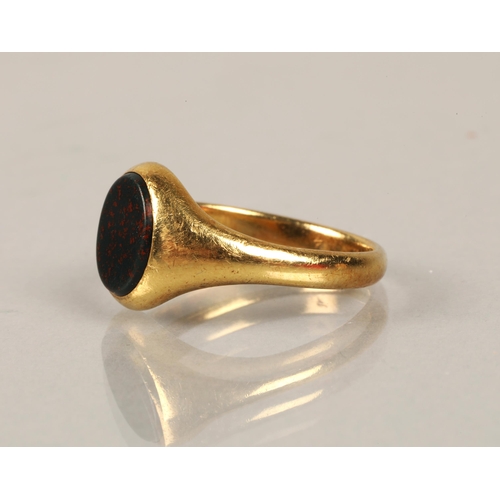 103 - 18ct gold signet ring set with bloodstone, ring size M, 4.7g