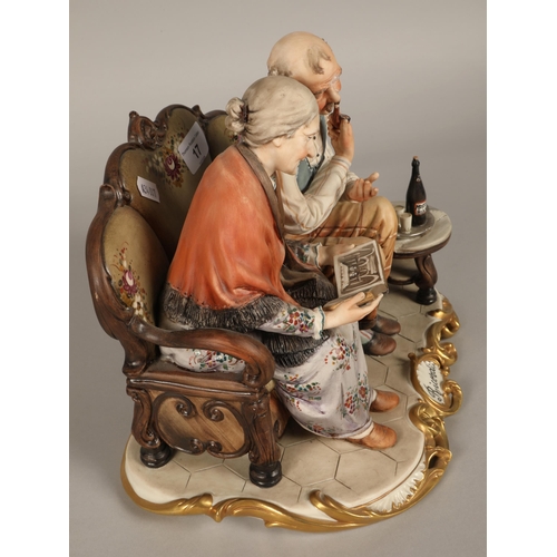 17 - Capodimonte figure, elderly couple seated