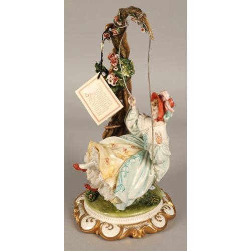 26 - Capodimonte figure, girl on swing, 35cm high