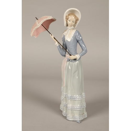 28 - Lladro figure, lady holding parasol, 32cm high