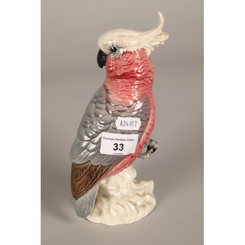 33 - Beswick cockatoo figure marked 1180, (damaged)approx. 20cm high