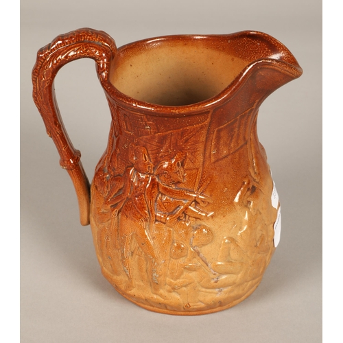 5 - Stoneware pitcher with military figures design in relief 