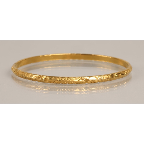 66 - High karat yellow gold bangle, 20.3g