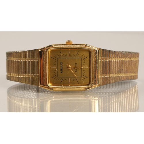 82 - Two Ablux gold toned quartz wristwatches