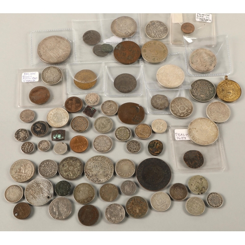 93 - Assortment of historic world coins, some silver