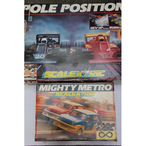 1109 - Hornby Scalextric C695 Pole Position Racing Set boxed and C880 Mighty Metro Racing set boxed. (2)