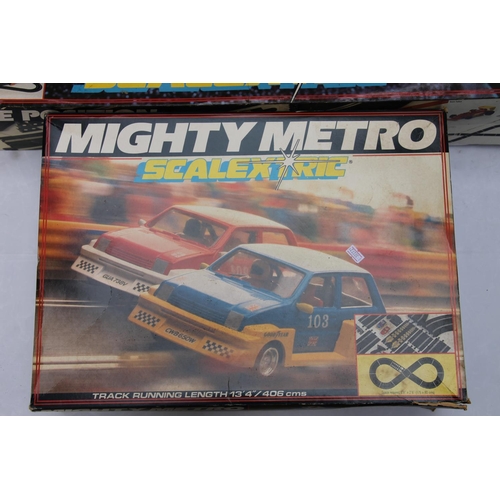 1109 - Hornby Scalextric C695 Pole Position Racing Set boxed and C880 Mighty Metro Racing set boxed. (2)