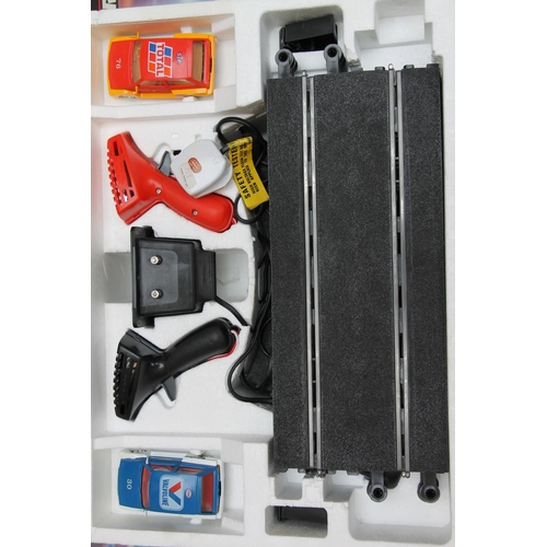 1109 - Hornby Scalextric C695 Pole Position Racing Set boxed and C880 Mighty Metro Racing set boxed. (2)
