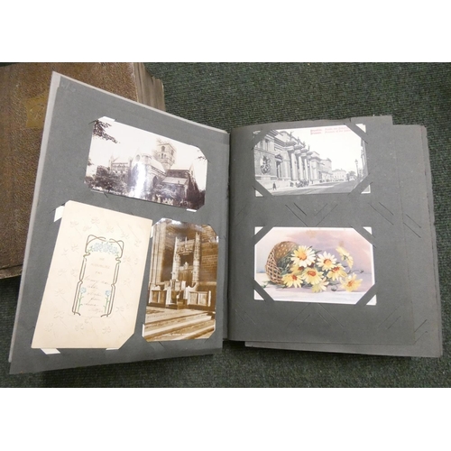 27 - <strong>Postcards.  </strong>2 thick quarto albums containing very many old postcards, mainly UK top...