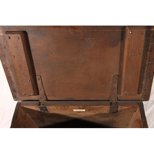 382 - Small oak coffer chest, the front panel deep carved in the gothic fashion, plain plank sides and hin... 