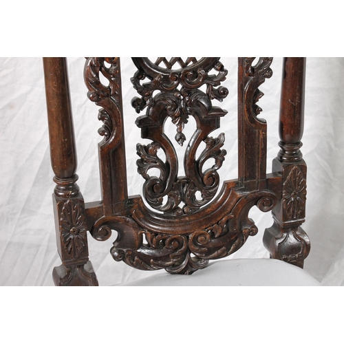 383 - Victorian carved high back chair in the William and Mary style, the ornate pierced and carved back o... 