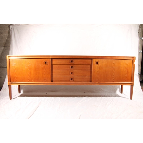 388 - H. W. Klein for Bramin Mobler, a Danish teak mid-century sideboard, fitted with a central bank of fo... 