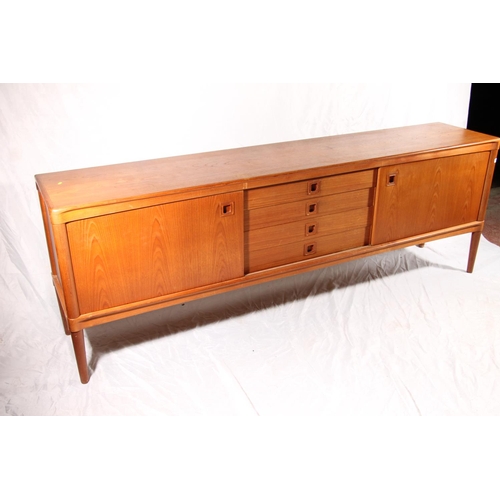 388 - H. W. Klein for Bramin Mobler, a Danish teak mid-century sideboard, fitted with a central bank of fo... 