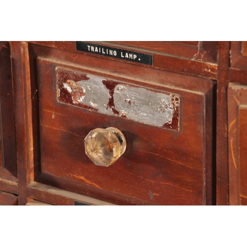 401 - Early 20thC apothecary chemists bank of drawers with original labels, later set into a mahogany and ... 