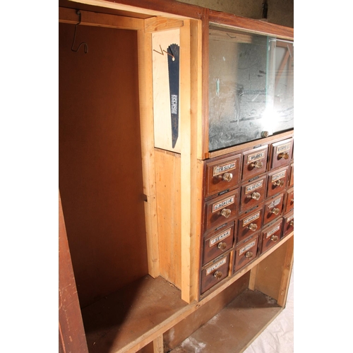 401 - Early 20thC apothecary chemists bank of drawers with original labels, later set into a mahogany and ... 