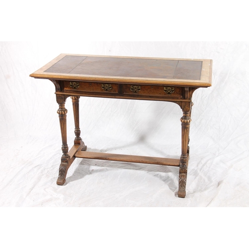 405 - Victorian ladies writing table, the walnut frame around a tooled leather skiver over two frieze draw... 