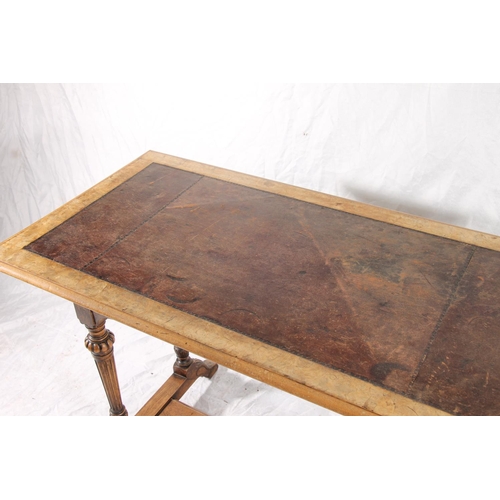 405 - Victorian ladies writing table, the walnut frame around a tooled leather skiver over two frieze draw... 