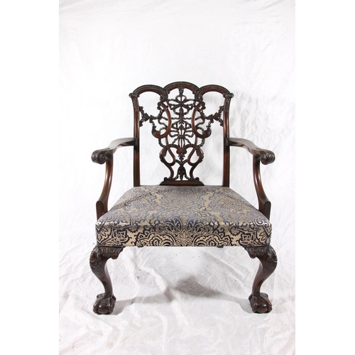 406 - Victorian Chippendale style mahogany low elbow chair, having a pierced and carved splat, scrolled ar... 