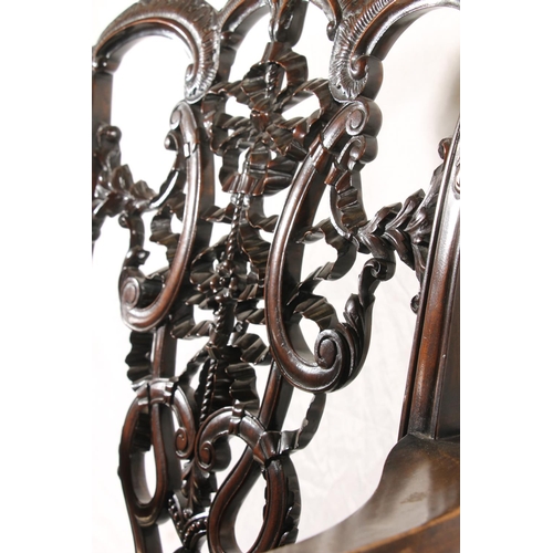 406 - Victorian Chippendale style mahogany low elbow chair, having a pierced and carved splat, scrolled ar... 