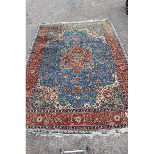 416 - Persian Kashan or Tabriz carpet, the blue ground with a central predominately red medallion, decorat... 