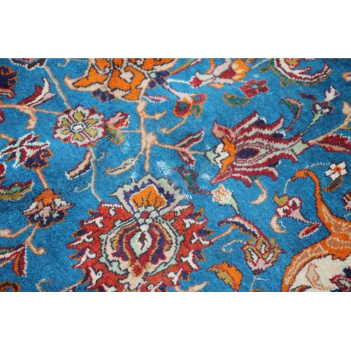 416 - Persian Kashan or Tabriz carpet, the blue ground with a central predominately red medallion, decorat... 