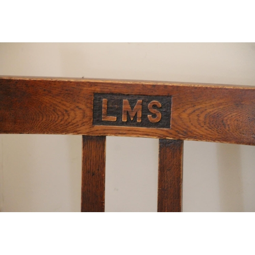 367 - 1920s oak LMS London Midland Scottish station armchair, H96cm.