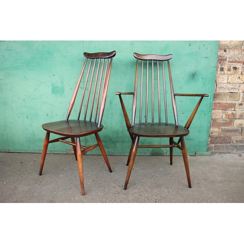 380 - Six Ercol Goldsmith windsor dining chairs with eight matching elbow chairs.