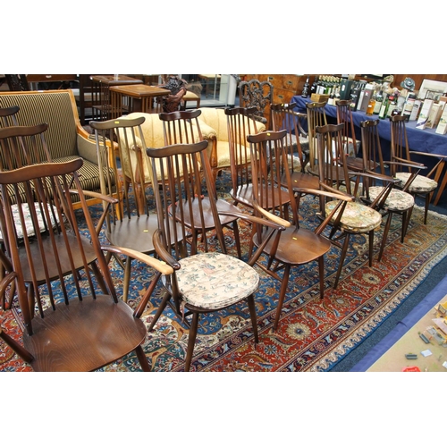 380 - Six Ercol Goldsmith windsor dining chairs with eight matching elbow chairs.