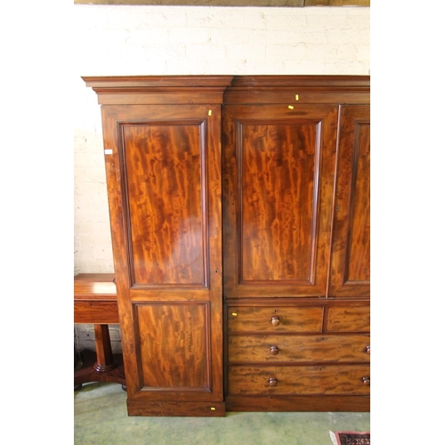 413 - Victorian mahogany inverted breakfront compactum, the moulded cornice over central doors with shelve... 