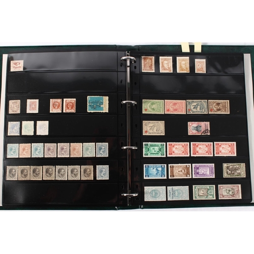 1292 - Stamp collection held across two Stanley Gibbons Avon green leatherette ring binder albums containin... 