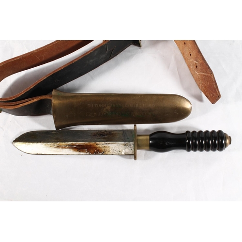 1443 - Siebe Gorman divers knife in sheath on brown leather belt, the sheath with inscription 'To Tommy And... 