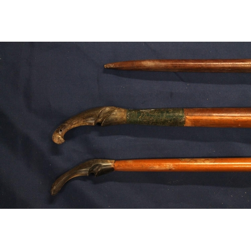 1452 - Three archery bows to include a Muir of Edinburgh 172cm long bow with horn terminals, stamped '27', ... 