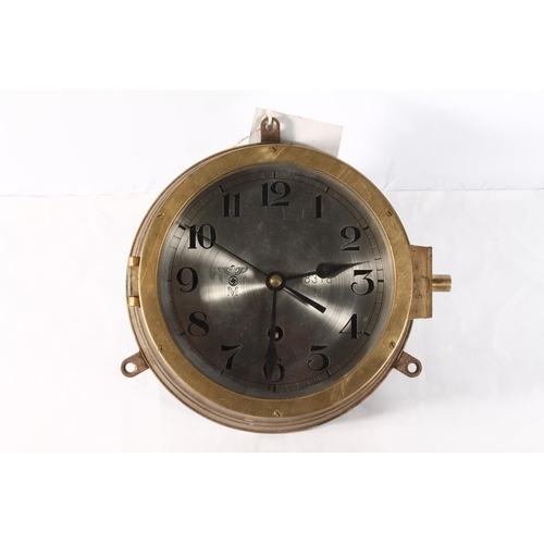 1455 - WWII era German Kriegsmarine U-Boat brass cased bulkhead clock, the silvered dial set with Arabic nu... 