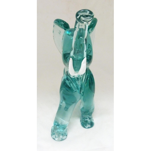 331 - Attributed to Archimede Seguso for Murano Aquamarine-coloured glass figure of an elephant, standing ... 