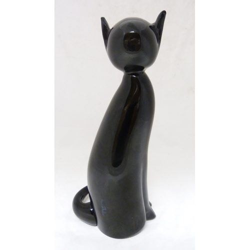 332 - Murano by Formia Glass figure of a black cat, c. 1970s, the face with white opalescent features, sig... 