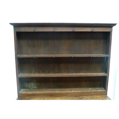 509 - 18th century oak dresser with open Delft shelving above three short drawers to the base, on pad feet... 