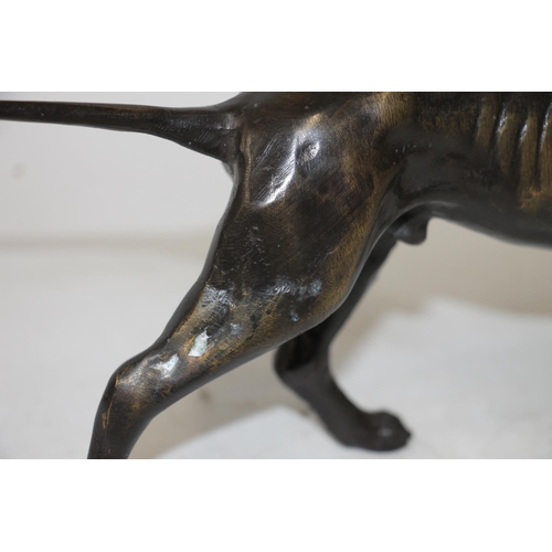 287 - Cast hollow patinated bronze model of a retriever, L25cm